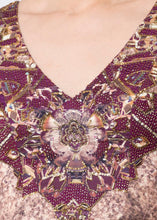 GOWN WITH A TRAIL