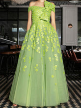 Embellished tulle gown with bow front