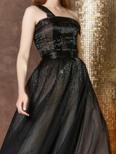 Richly embellished tulle volume gown