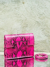 Pink Snake Print Leather Clutch