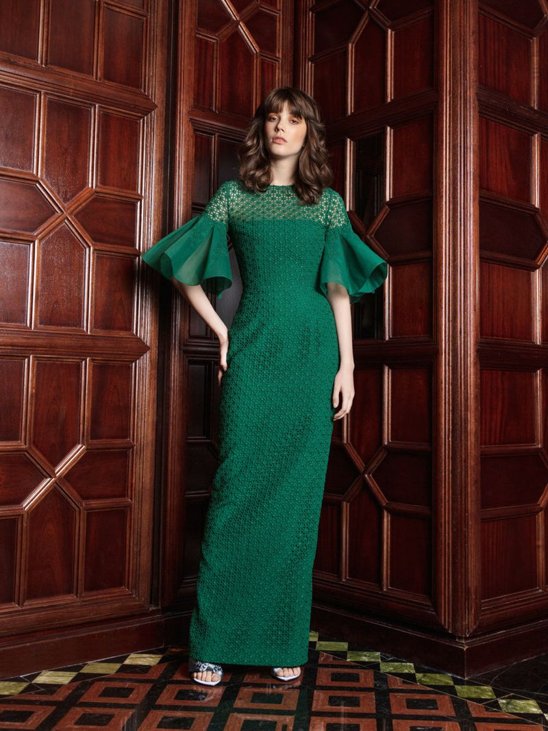 box pleated dress with sleeves Avril gown, A box pleated dress features a type of pleating where fabric is folded into square-shaped pleats, giving the dress a structured and voluminous look. , A half-shoulder gown, also known as